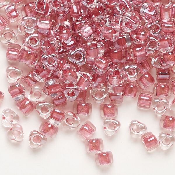 Seed bead, Miyuki, glass, transparent clear color-lined rose, (TR1132), #5 triangle. Sold per 25-gram pkg. image number 0