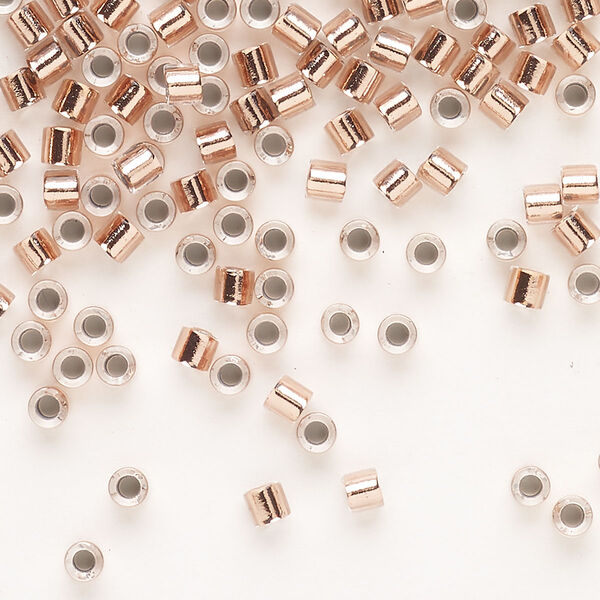 Seed bead, Delica®, glass, pkg/50g, #8 round, transparent copper-lined crystal clear (DBL-0037). image number 0