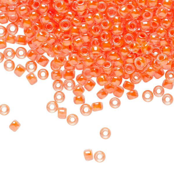 Seed bead, TOHO BEADS®, glass, pkg/7.5g, #8 round, translucent luminous inside color neon salmon (TR-08-803). image number 0