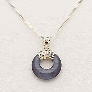 Necklace, cat's eye glass / gold-finished steel / brass / "pewter" (zinc-based alloy), black, 18mm round donut, 17 inches with 2-inch extender chain and lobster claw clasp. Sold individually.