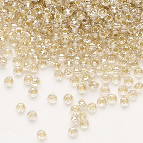 Seed bead, Preciosa Ornela, glass, translucent mocca pearl-lined crystal clear, #8 rocaille. Sold per 50-gram pkg. image number 0