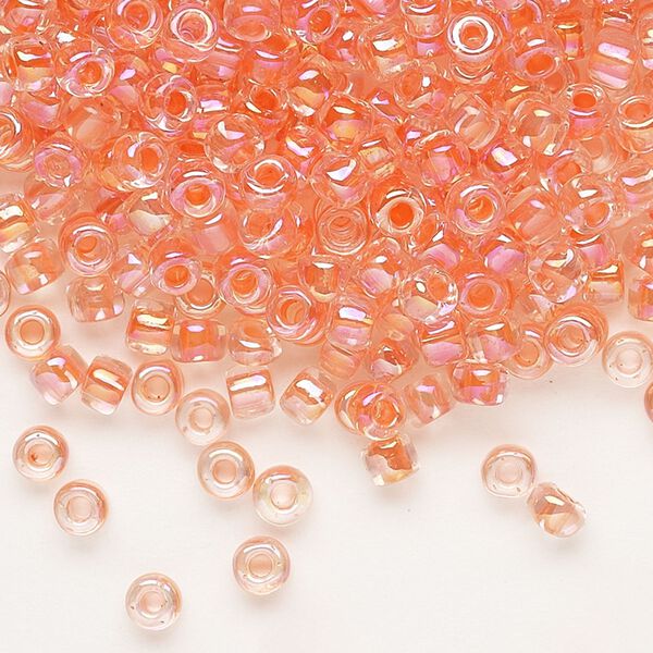 Seed bead, Dyna-Mites™, glass, transparent rainbow inside color peach, #6 round. Sold per 1/2 kilogram pkg. image number 0