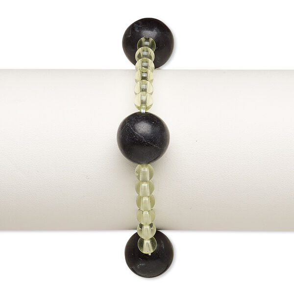 Bracelet, stretch, blackstone (dyed) and acrylic, light green, 5mm and 15-16mm round, 6 inches. Sold individually. image number 0