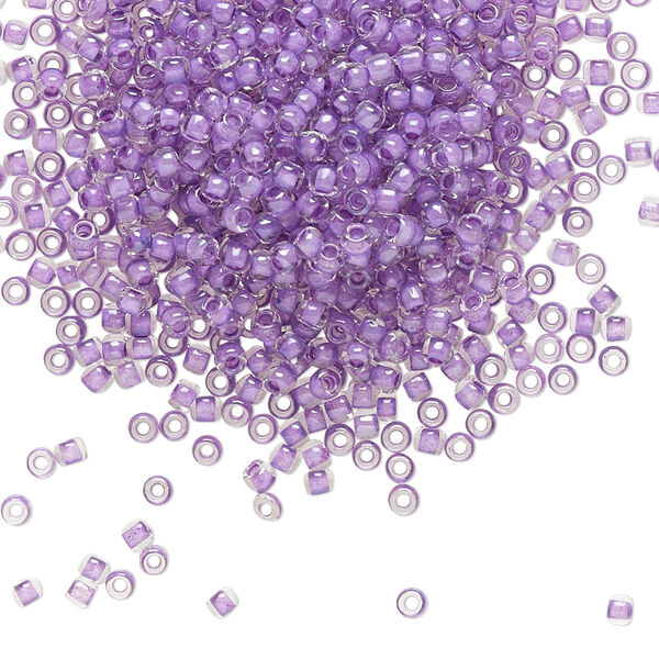 Seed bead, TOHO BEADS®, glass, pkg/7.5g, #11 round, translucent wisteria-lined crystal clear (TR-11-935). image number 0
