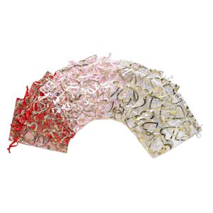 Pouch, organza, pink / red / white, 4-1/2 x 3 inches with metallic gold heart pattern and drawstring closure. Sold per pkg of 12.
