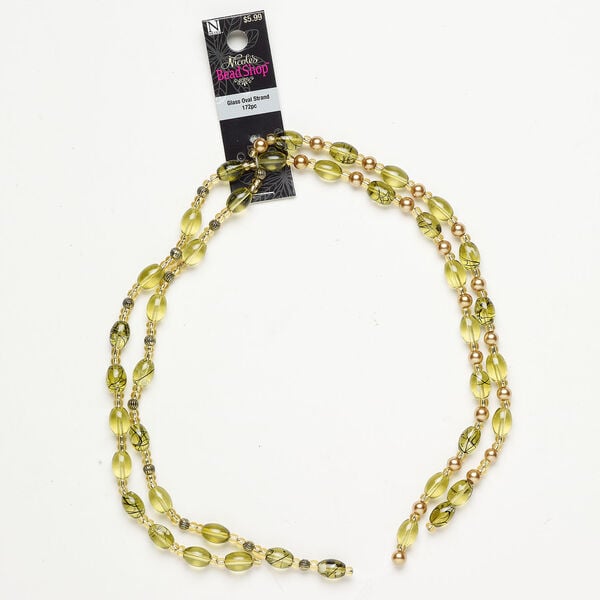 Bead mix 1pkg172, transparent and opaque glass and plastic, green / gold / black, 8/0 round seed bead / 6mm round / 11x8mm-11x9mm oval. image number 0