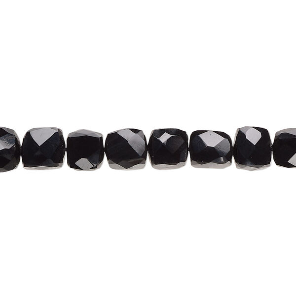 Bead, black onyx (dyed), 5mm-7x6mm hand-cut faceted cube with 0.4-1.4mm hole, B grade, Mohs hardness 6-1/2 to 7. Sold per 10-inch strand, approximately 40 beads. image number 0