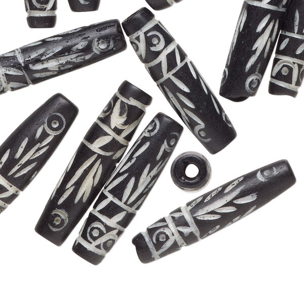 Bead, bone (dyed), black with white, 24.5x6mm carved tube, Mohs hardness 2-1/2. Sold per pkg of 20. image number 0
