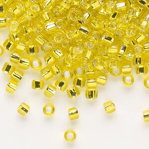 Seed bead, Dyna-Mites™, glass, silver-lined translucent yellow, #6 round with square hole. Sold per 40-gram pkg.