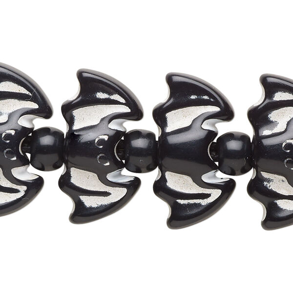 Bead, acrylic, black and white, 7x5.5mm crow and 23x13mm bat. Sold per 7-inch strand. image number 0