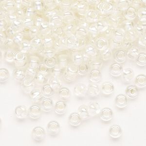 Seed bead, Preciosa Ornela Czech glass, pkg/500g, #6 rocaille, translucent color-lined luster pastel ivory, (382PI).