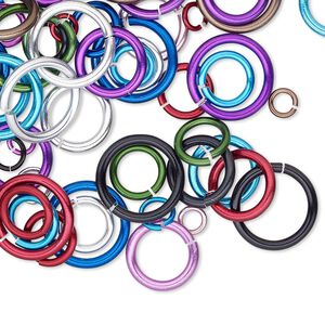 Jump ring mix, anodized aluminum, mixed colors, 4-12mm round, 2.5-9.2mm inside diameter, 14-20 gauge. Sold per pkg of 100.