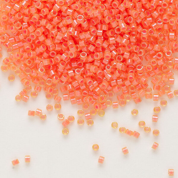 Seed bead, Delica®, glass, pkg/7.5g, #11 round, translucent luminous inside dyed color orange (DB-2047). image number 0