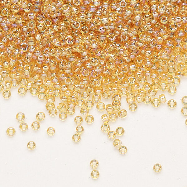 Seed bead, Miyuki, glass, pkg/25g, #11 rocaille, translucent rainbow light topaz (RR-251). image number 0