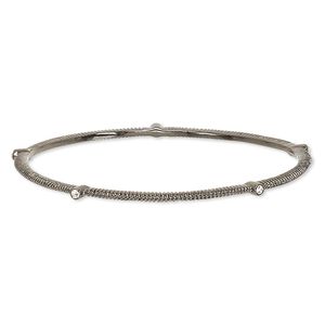 Bracelet, bangle, glass rhinestone and gunmetal-plated brass, clear, 3mm wide with corrugated design, 8 inches. Sold individually.