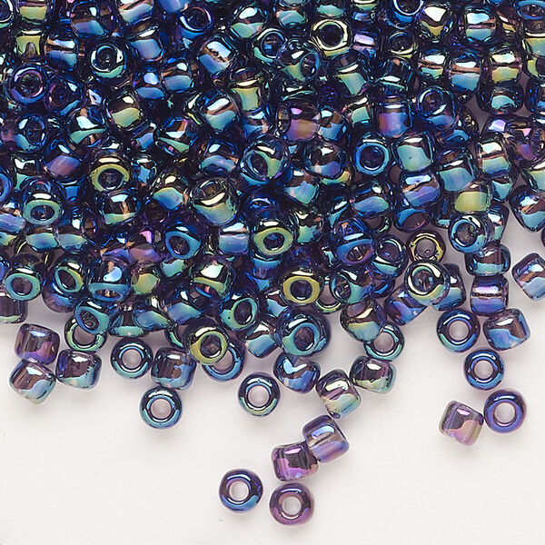 Seed bead, Dyna-Mites™, glass, transparent rainbow purple, #6 round. Sold per 1/2 kilogram pkg. image number 0
