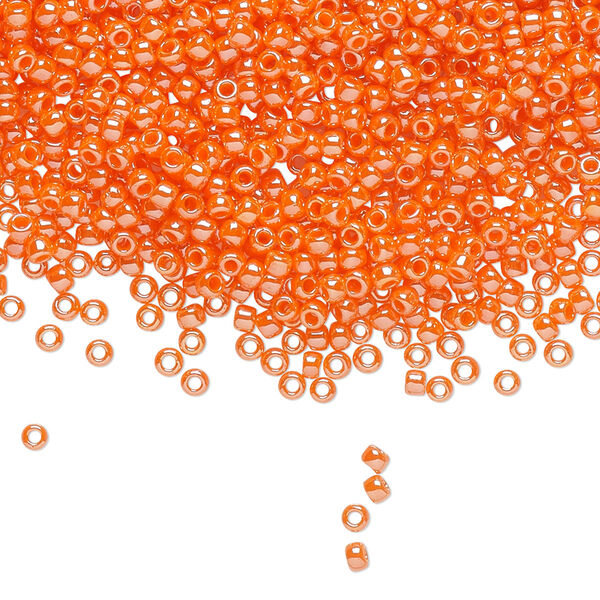 Seed bead, TOHO BEADS®, glass, pkg/7.5g, #11 round, opaque luster pumpkin (TR-11-129). image number 0
