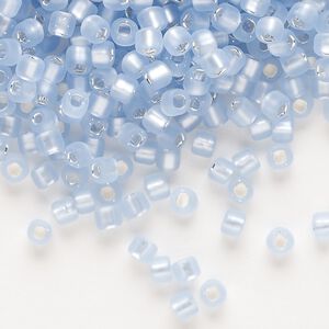 Seed bead, Dyna-Mites™, glass, silver-lined translucent matte pale blue, #6 round with square hole. Sold per 1/2 kilogram pkg.