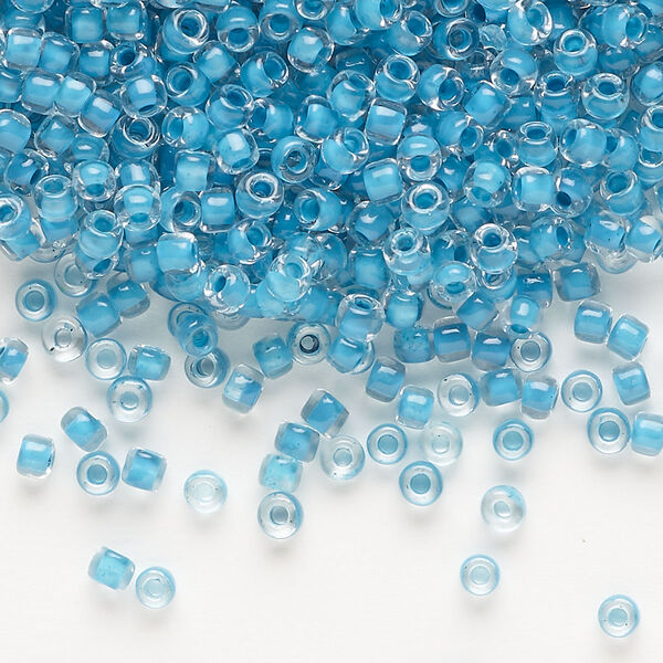 Seed bead, Dyna-Mites™, glass, translucent inside color turquoise blue, #8 round. Sold per 1/2 kilogram pkg. image number 0