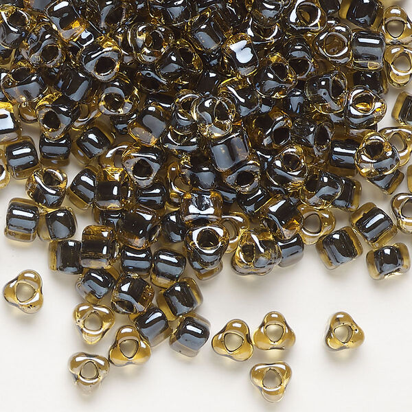 Seed bead, Miyuki, glass, transparent amber yellow color-lined brown, (TR1840), #5 triangle. Sold per 25-gram pkg. image number 0