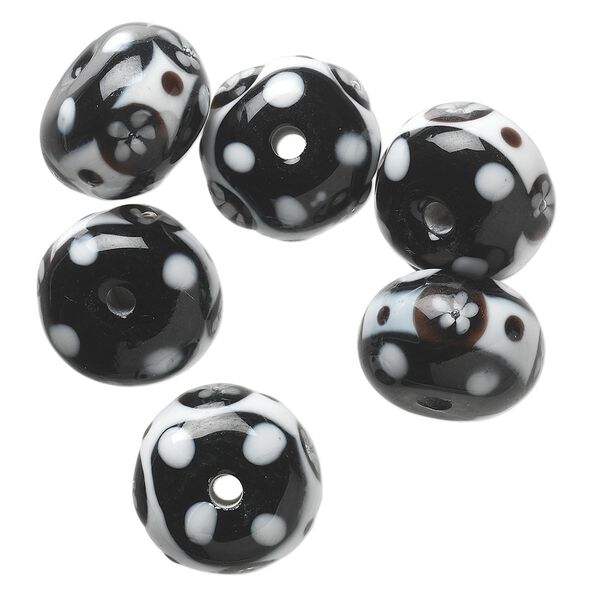 Bead, lampworked glass, opaque white and black, 17x12mm rondelle with flower and dot design. Sold per pkg of 6. image number 0