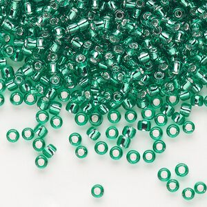 Seed bead, Dyna-Mites™, glass, silver-lined translucent jade green, #8 round. Sold per 1/2 kilogram pkg.