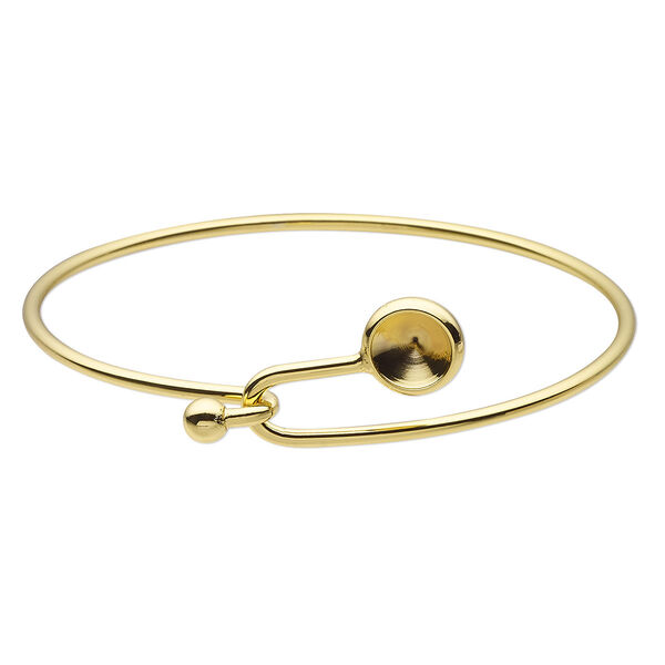 Bracelet, Almost Instant Jewelry®, bangle, gold-finished brass, 17mm wide with SS39 rivoli glue-in setting and hook closure, 7-1/2 inches. Sold individually. image number 0