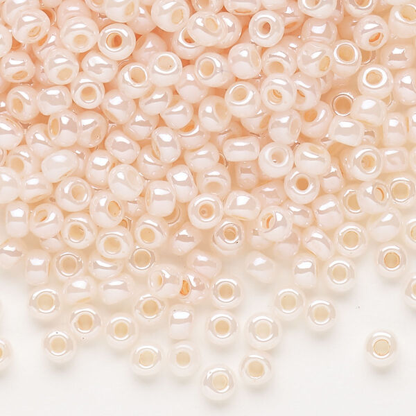 Seed bead, Dyna-Mites™, glass, opaque ceylon pastel peach, #6 round. Sold per 1/2 kilogram pkg. image number 0