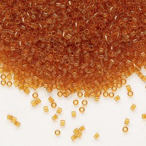 Seed bead, Delica®, glass, pkg/250g, #11 round, transparent topaz (DB-1101).