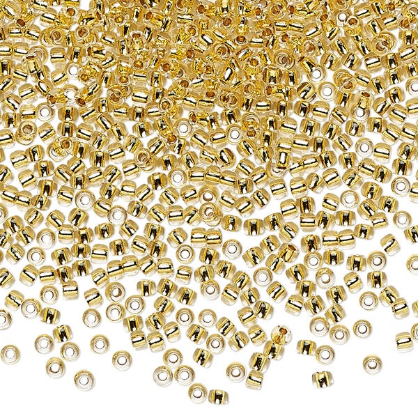 Seed bead, TOHO BEADS®, glass, pkg/250g, #11 round, transparent 24Kt gold-lined crystal clear (TR-11-701). image number 0
