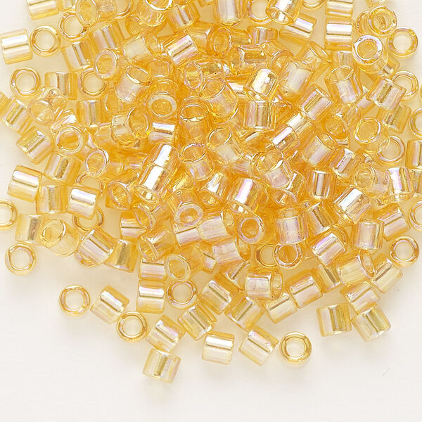 Seed bead, Delica®, glass, pkg/7.5g, #8 round, translucent rainbow light topaz (DBL-0100). image number 0