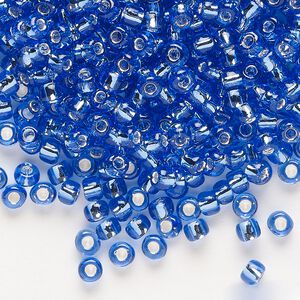 Seed bead, Dyna-Mites™, glass, transparent silver-lined light blue, #6 round. Sold per 40-gram pkg.