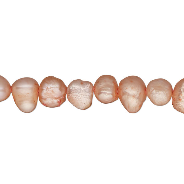 Pearl, cultured freshwater (dyed), salmon, 6-7mm flat sided potato, D grade, Mohs hardness 2-1/2 to 4. Sold per 15-inch strand. image number 0