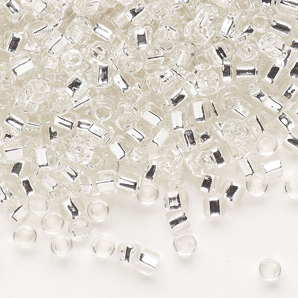 Seed bead, Dyna-Mites™, glass, silver-lined translucent clear, #6 round with square hole. Sold per 40-gram pkg. image number 0