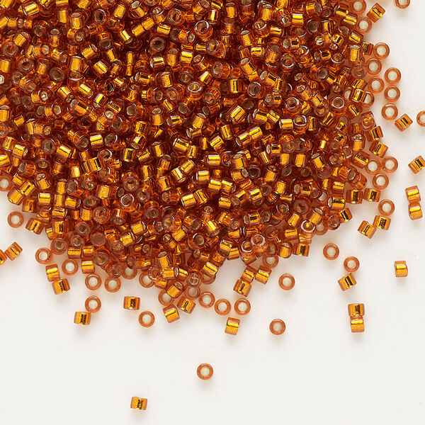 Seed bead, Delica®, glass, pkg/250g, #11 round, transparent outside dyed silver-lined burnt orange (DB-1333). image number 0