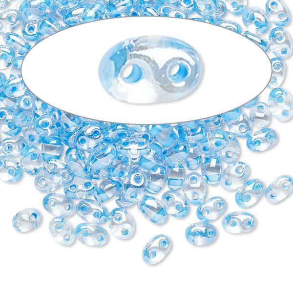 Seed bead, Preciosa Twin™ Czech glass, pkg/50g, 5x2.5mm oval, transparent sky blue terra color-lined clear, (38665). image number 0
