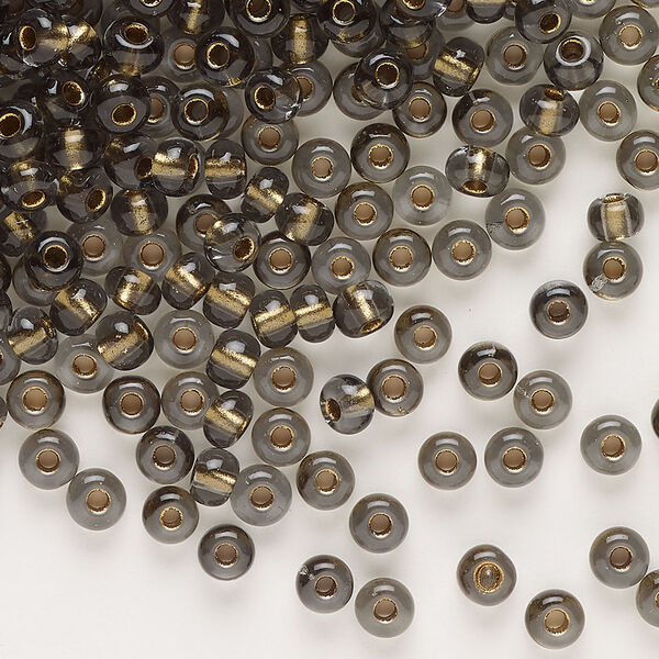 Seed bead, glass, pkg/50g, #6 rocaille, translucent color-lined bronze smoky quartz. image number 0