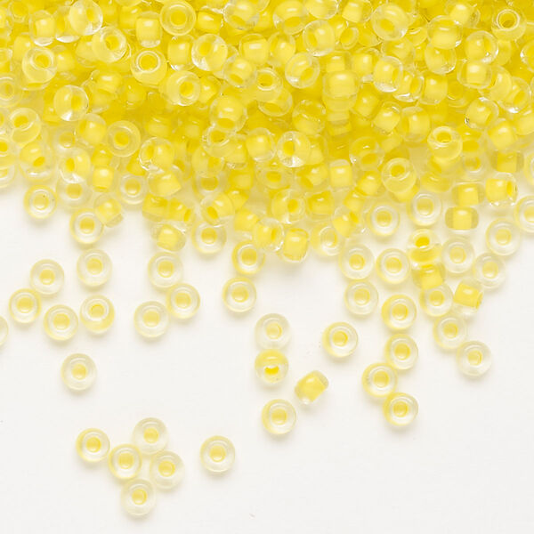 Seed bead, Preciosa Ornela Czech glass, pkg/50g, #8 rocaille, transparent terra intensive yellow-lined clear, (08A86). image number 0