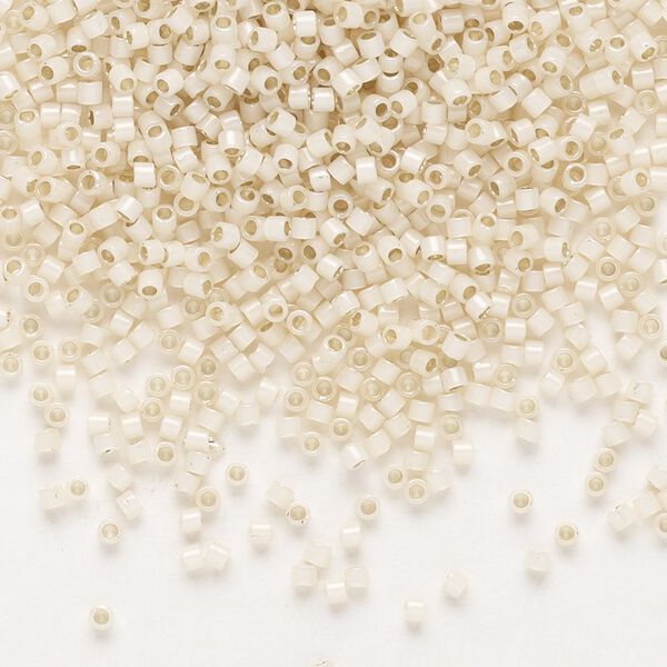 Seed bead, Delica&reg;, glass, pkg/7.5g, #11 round, translucent silver-lined glass enamel pale cream opal (DB-1451). image number 0