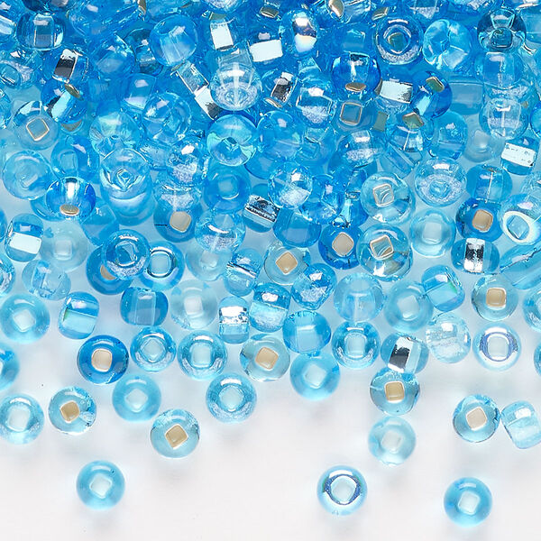 Seed bead mix, glass, pkg/100g, #6 rocaille, translucent multi-aqua. image number 0