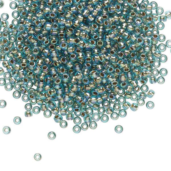Seed bead, TOHO BEADS®, glass, pkg/50g, #11 round, translucent gold-lined rainbow aqua (TR-11-995). image number 0