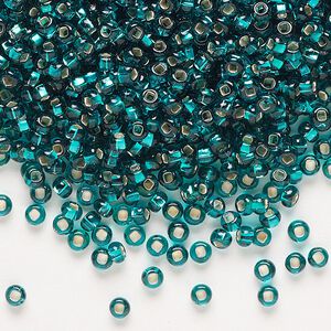 Seed bead, Preciosa Ornela Czech glass, pkg/50g, #8 rocaille, transparent silver-lined teal, (57710).