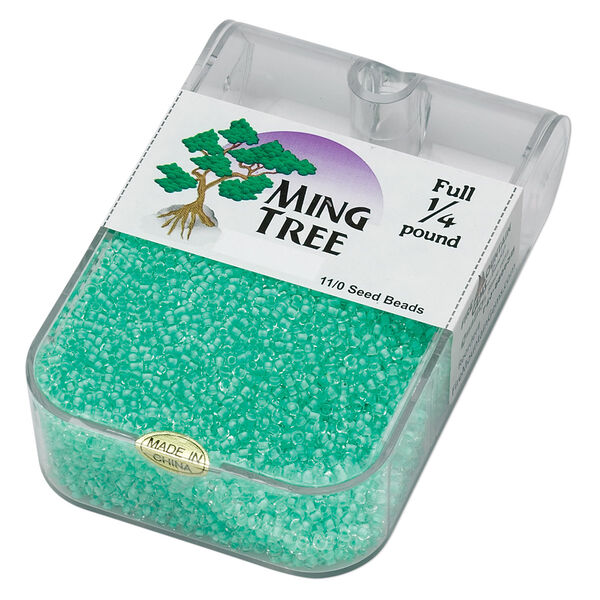 Seed bead, Ming Tree™, glass, pkg/1/4 pound, #11 round, transparent color-lined mint green. image number 0