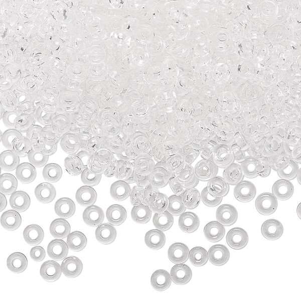 Seed bead, Miyuki, glass, pkg/10g, 3x1.3mm spacer rondelle, transparent clear, (SPR3-131). image number 0
