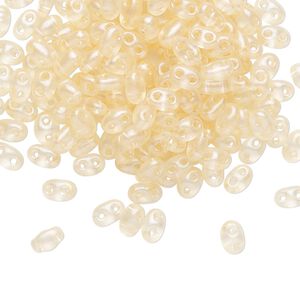 Seed bead, Preciosa Twin™ Czech glass, pkg/250g, 5x2.5mm oval, transparent light peach terra pearl clear, (08192).