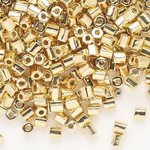 Seed bead, Dyna-Mites™, glass, opaque 24Kt gold-plated, #6 hex 2-cut. Sold per 1/2 kilogram pkg.