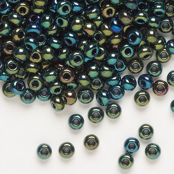 Seed bead, Preciosa Ornela, glass, opaque green iris black, #6 rocaille. Sold per 500-gram pkg. image number 0