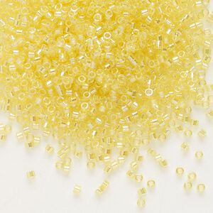 Seed bead, Delica®, glass, pkg/250g, #11 round, translucent rainbow yellow (DB-0171).