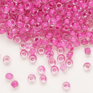 Seed bead, Dyna-Mites™, glass, translucent inside color hot pink, #6 round. Sold per 1/2 kilogram pkg.