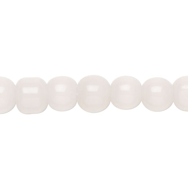 Bead, cat's eye glass, translucent light pink, 7-9mm round. Sold per 12-inch strand, approximately 40 beads. image number 0